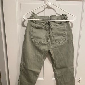 Olive green distressed stretch jeans